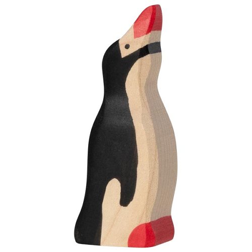 Pingüino pequeño con la cabeza alta